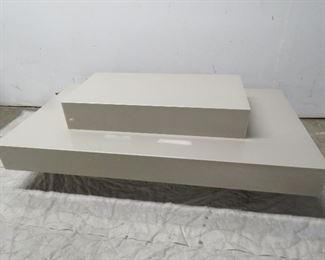 ITEM 63---Lucite tiered coffee table. 50" long, 27" wide, 10" high. $175.00