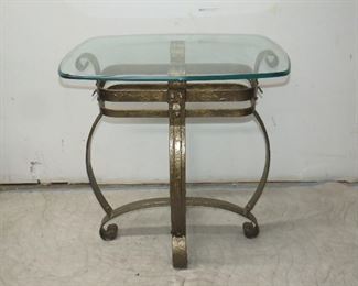 ITEM 66---Brutalist style wrought iron w/ beveled glass top. 271/4" long, 20 1/4 wide, 29 1/4" high. $150.00