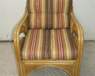 ITEM 72---Rattan armchair palm tree motif. 26.5" wide,32" deep, 30 3/4" high, seat height 12" -w cushion 16", $125.00