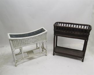ITEM 89---2 wicker planters with metal liners inside. Newer Brown planter measures 30" long, 12" wide, 31" high. White- 31" long, 9.5" wide, 27" high $75.00