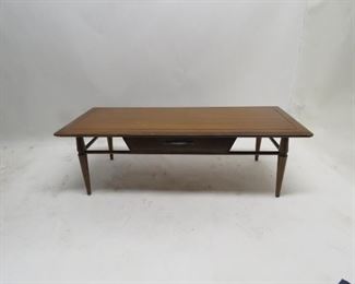 ITEM 95 ---MCM coffee table with drawer, legs wobbly, 48" long,20" wide, 14.5" high. $ 100.00