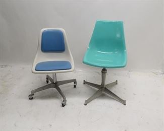 ITEM 107---2 MCM plastic swivel chairs. surface marks , 1has chip see photo. $50.00