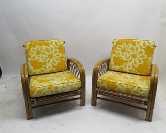 ITEM 108---Pair of rattan chairs. 24.5" wide, 31.5" deep, 27" high, 11.5" high to seat. $ 200.00