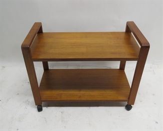 ITEM 113---MCM danish teak rolling cart with dovetailed corners. 31" long, 16" wide, 23 1/4 high. surface blemishes, $ 75.00