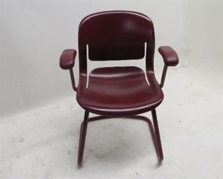 ITEM 118---Herman Miller plastic armchair with metal base. some surface scratches. $60.00