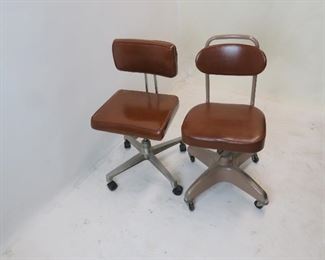 ITEM 121A —-2 MCM industrial adjustable swivel chairs. round back 16 3/4"wide, 18" deep, $100.00