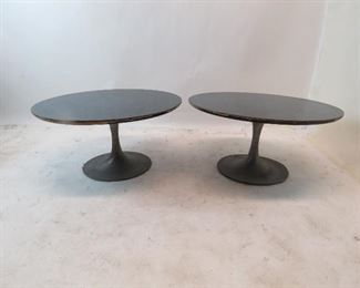 ITEM 130---pair of Saarinen style tulip metal base tables with laminate. tops have chips and edges are worn. 29.5" diameter, 15" high $175.00