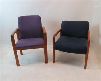 ITEM 127---2 MCM upholstered teak arm chairs purple, 23 3/4"w, 24" deep, 34" high. $100.00