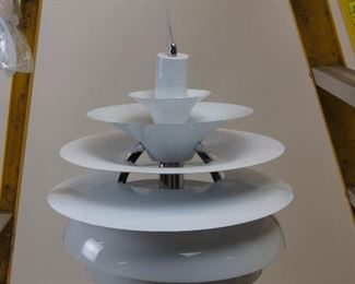 ITEM 140 ---contemporary copy of Poul Henningsen snowball lamp. has small dent bottom of middle circle. $200.00