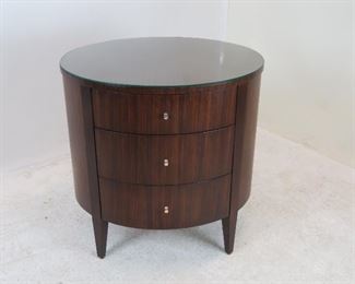 ITEM 147 ---Ethan Allen 3 drawer oval cabinet with glass top. 26" wide, 21" deep, 26.25" high. $250.00