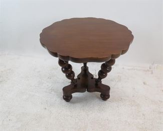 ITEM 150 ---Kent of Grand Rapids twist leg pie top table. 27" diameter, 24.5" high. $125.00