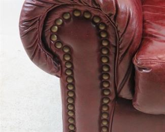 Robinson and Robinson leather arm chair with brass tacking. PIC 3