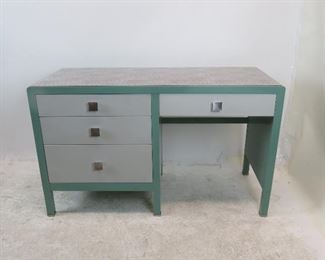 ITEM 162 ---Norman Bel Geddes for Simmons furniture metal industrial desk, with speckled laminate top. 50.5" wide, 21" deep, 30.5" high. $400.00