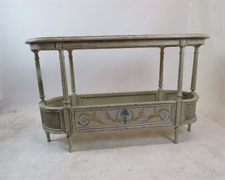 ITEM 179 ---French style 2 tier console table with double cane corners. distressed and hand painted, artist signed - Steve B 2006. 55" long, 18.5" wide, 33.5" high $250.00
