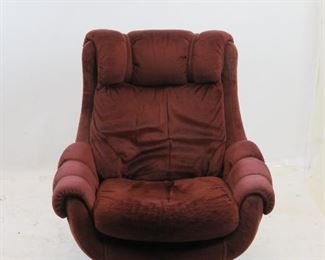 ITEM 180 ---Overman style upholstered swivel lounge chair. 35" wide, 36" deep, 37" high, 17" high to seat. $250.00