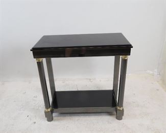 ITEM 188 ---DIA steel brass, black beveled glass console table. 29.5" wide, 14" deep, 29" high. $225.00