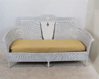 ITEM 219--- antique wicker sofa. 66" long, 26" deep, 37" high. 13" high to seat. $125.00