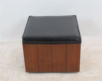 ITEM 230-- MCM wood and vinyl ottoman on wheels. 16" square, 12.5" high. $50.00