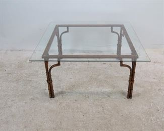 ITEM 231--- Faux bamboo gilt metal glass top table. glass top 33.5" square, base-28" square, 16" high. $200.00