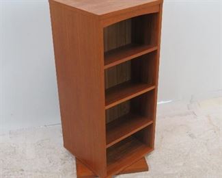 ITEM 232--- Danish modern teak revolving cabinet, signed-made in Denmark. 13.75" wide, 13.75" deep, 31.75" high, surface marks, base repair. $75.00