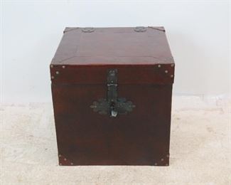 ITEM 255--- Decorative Leather trunk, some nicks and scratches. 21" wide, 20" deep, 19.75" high. $40.00