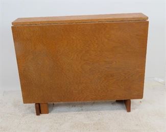MCM dropleaf folding table. Has some chips, veneer loss, scratches. PIC 2