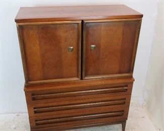 ITEM 311-- MCM mans dresser / high chest chifferobe by Bassett. 42.25" wide, 19" deep, 54.75" high. $450.00