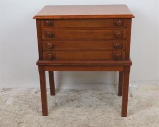 ITEM-360-- 4 drawer spool cabinet on legs. some surface scratches. 25" wide, 14.5" deep, 29.25" high $150.00