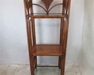 ITEM-372= Rattan 3 shelf Etagere w/ palm leaf motif. 29.75" wide, 18.25" deep, 77.75" high $175.00