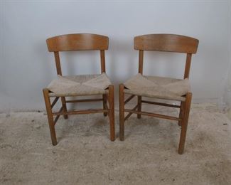 ITEM- 378 - pair of MCM oak chairs with woven rope seats. finish is worn. 9" wide, 15.5" deep, 29.75" high, 17"high to seat. $350.00