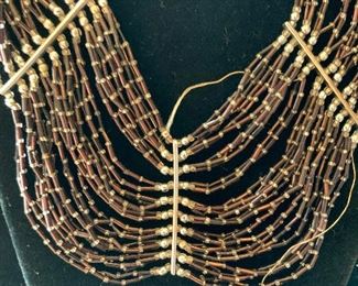 Multi Strand Bead and Silver toned Necklace