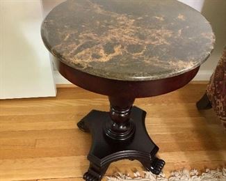 $125 Marble top pedestal table 28.5 " diameter by 21" high 