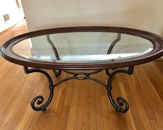 $100 Oval glass table 50" L by 30 W by 21.5" H AS IS