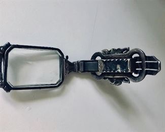 Lorgnette partially open