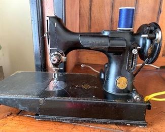 vintage Singer sewing machine with hard case