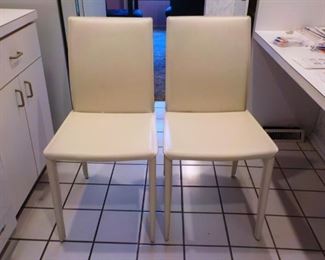 2 Off-White Leatherette  Chairs  $25