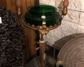 Antique green fishbowl and stand.