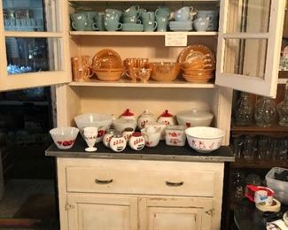 Jadeite, Delphite blue Fireking, Peach lusterware, fantastic salt and pepper sets, and wonderful old painted kitchen cabinet.