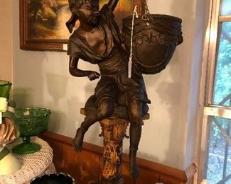 Pair of cast statues.