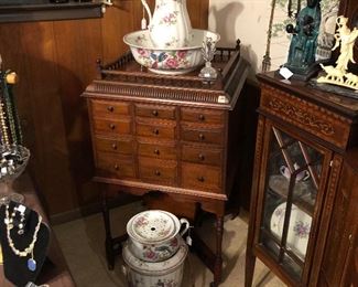 Rare antique 4 sided sewing cabinet with hard to find chamber pot and toilet, matching pitcher and basin.