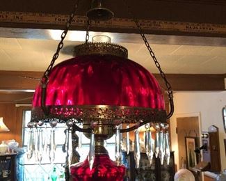 ruby red oil lamp chandelier.  very impressive.