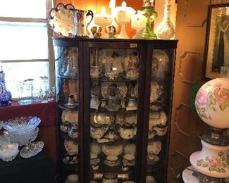 Beautiful advertising calendar plates, milk glass and cobalt and flower teapots, cups and saucers.