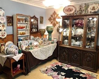Large Roseville jardiniere, vintage water pitcher, turkey platters, China, tea cart, china hutch, and beautiful plates.