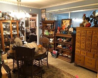 Wonderful large oak filing cabinet, vintage fans, and chalk Matador and Flamenco dancers.