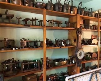 more pipes, pipe stands, and tea kettles.