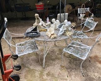 vintage white metal patio furniture table and 4 chairs.  very comfortable.