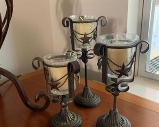 $58 - Set of three metal Texas motif candle holders 