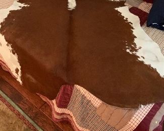 $175~   COWHIDE RUG