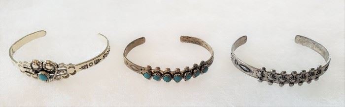 1) Child size Sterling silver rope heart & turquoise cuff bracelet
2) Child size Sterling silver cuff bracelet with 6 turquoise stones, Fred Harvey era 1920s-1940s
3) Child size Sterling silver cuff bracelet stamped Sanford, Fred Harvey era 1920s-40s