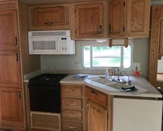 Kitchen in 2001 Alfa Gold GF38RLTES 5th wheel trailer w/3 slide outs